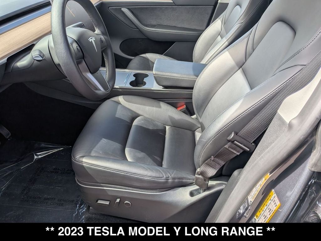 Used 2023 Tesla Model Y Long Range with VIN 7SAYGDEE7PF781169 for sale in Okemos, MI